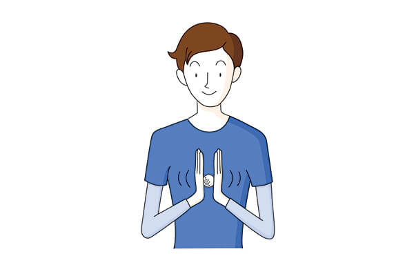 ゴルフボールを手のひらで挟んで転がす